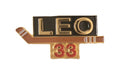Eishockeypin Leo 33 mit Eishockeyschläger